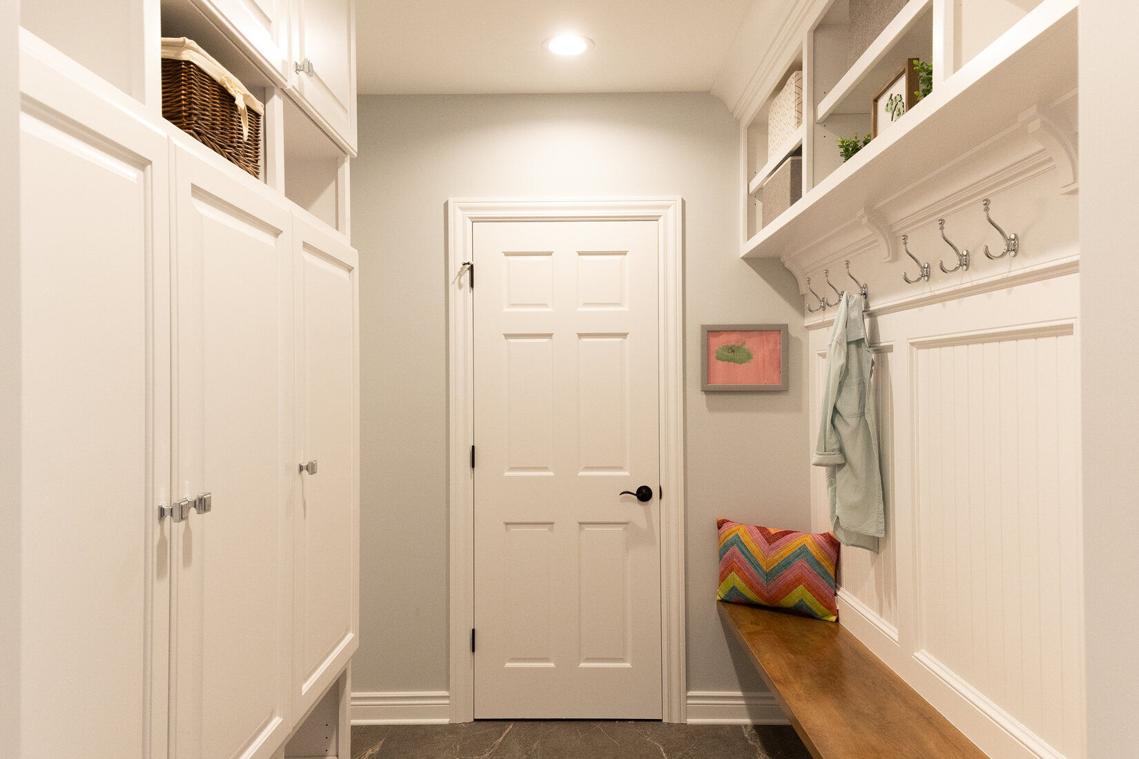 Mudroom addition with ample storage and custom cabinetry by Ridgewood Home Construction in Grand Rapids, MI