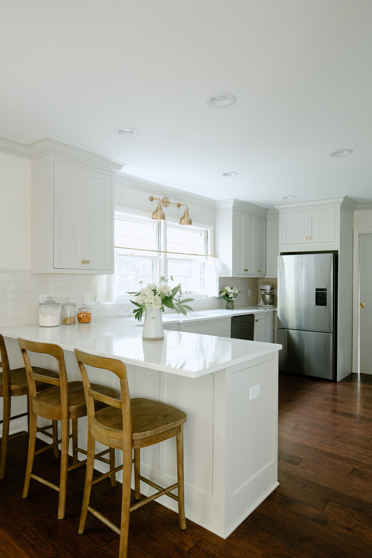 West Michigan kitchen remodel with shaker cabinets and wood bar stools by Ridgewood Home Construction