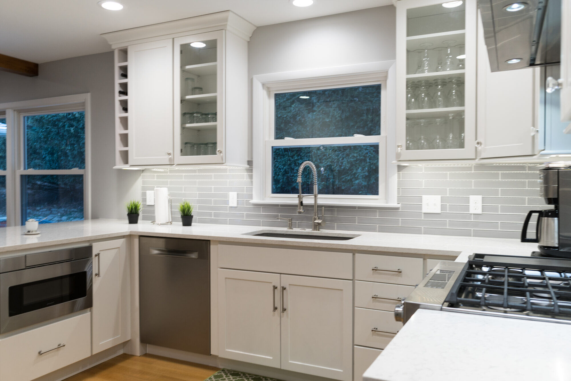 Kitchen sink and microwave setup in Rockford, MI remodel by Ridgewood Home Construction